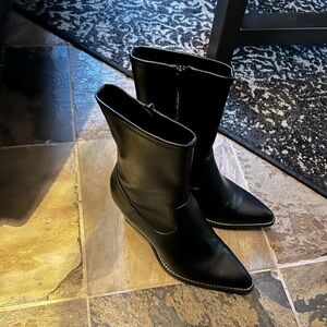 Worn once! Black boots in size 7.5, super comfy, soft material. Excellent cond.